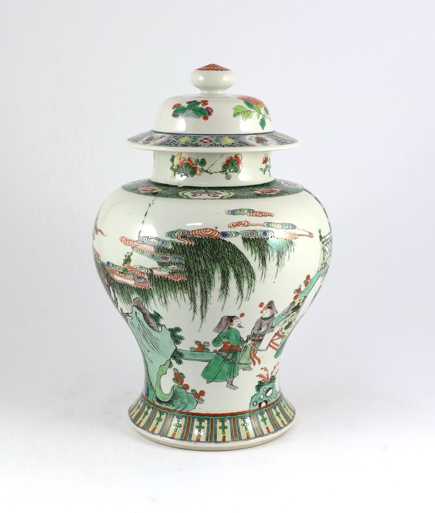 A Chinese famille verte jar and associated cover, 19th century, 41cm high, damaged and matched cover